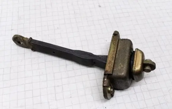 Volvo S40, V40 Rear door check strap stopper