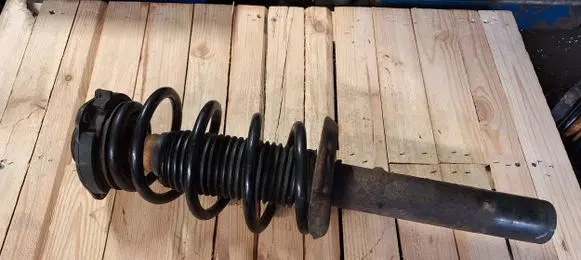 Skoda Octavia Mk2 (1Z) Front shock absorber with coil spring