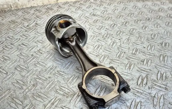 Piston with connecting rod