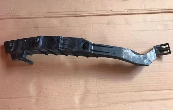Headlight/headlamp mounting bracket