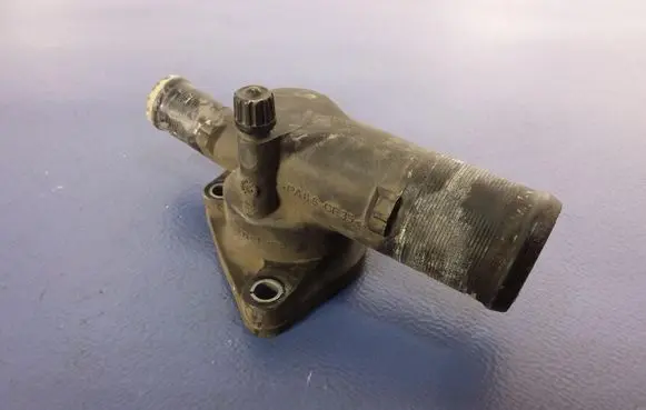 Thermostat/thermostat housing