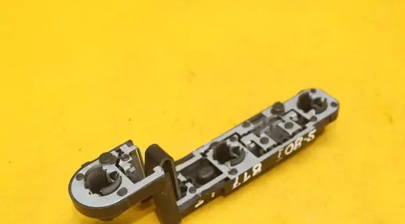 Tail light bulb cover holder