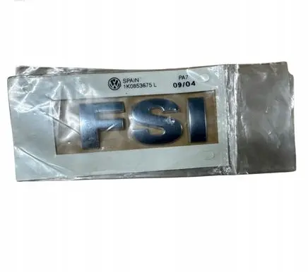 Volkswagen Up Manufacturers badge/model letters 1K0853675L