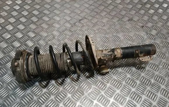 Audi A2 Front shock absorber with coil spring