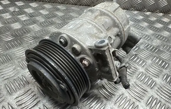 Opel Astra K Air conditioning (A/C) compressor (pump) 39034464 1076B4 R34AR1234V1