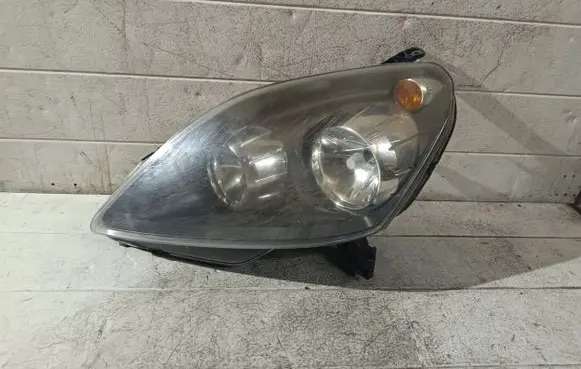 Opel Zafira B Headlight/headlamp 24451052LH