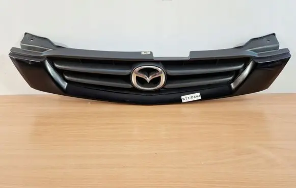 Mazda Demio Front bumper upper radiator grill DC3550712