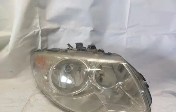 Chrysler Voyager Headlight/headlamp 04857830AC