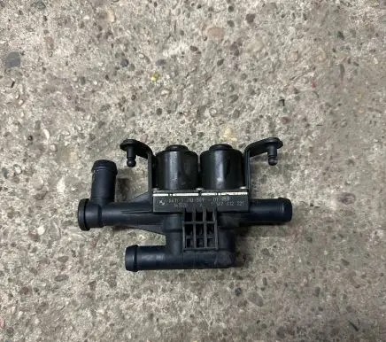 Coolant heater control valve
