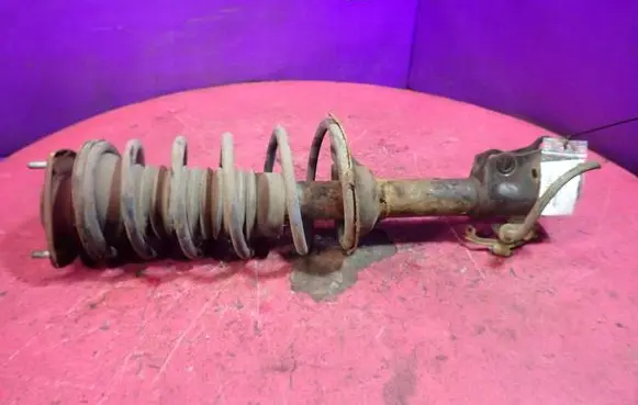 Toyota Yaris Verso Front shock absorber with coil spring