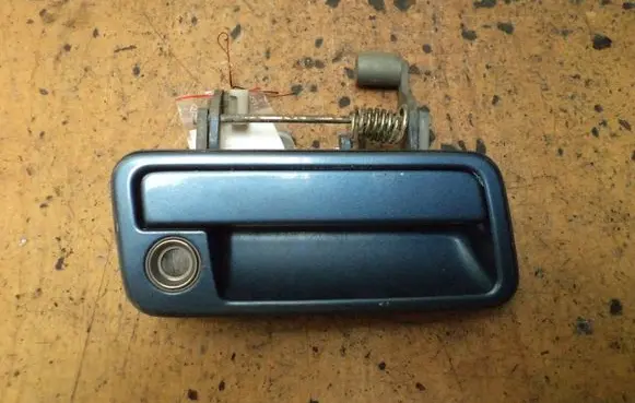 Mazda 323 Front door exterior handle