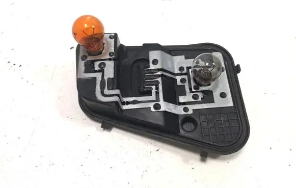 Volkswagen Touareg I Tail light bulb cover holder 7L6945257 28252102