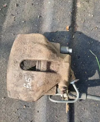 Volkswagen PASSAT B5 Front brake caliper