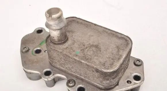 Opel Astra J Engine oil radiator 55573795