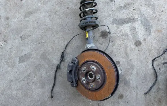 Opel Astra J Front shock absorber/damper 13390298