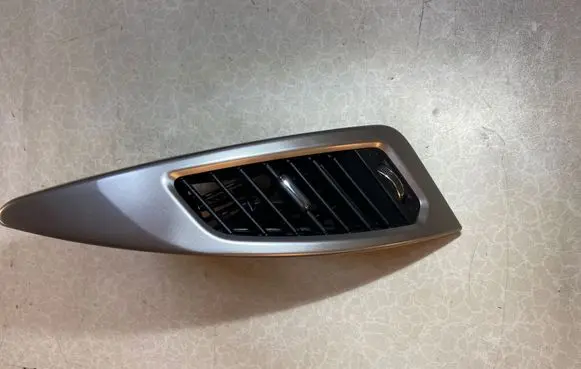 SsangYong Korando Dash center air vent grill 6962M34400