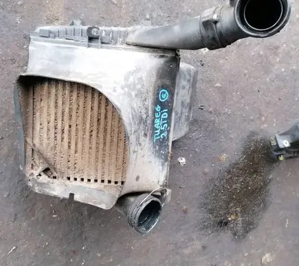 Volkswagen Touareg I Intercooler radiator 7L0117339
