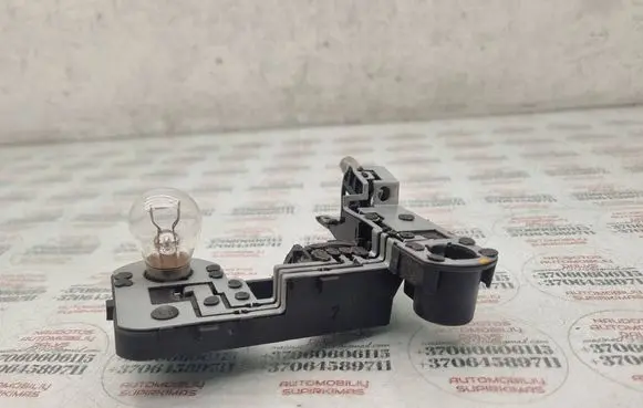 Volkswagen Touareg I Tail light bulb cover holder 7L6945260A