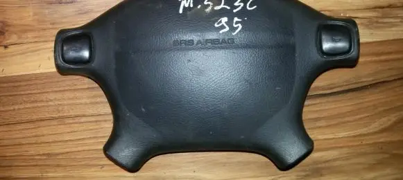Mazda 323 Steering wheel airbag T93013A