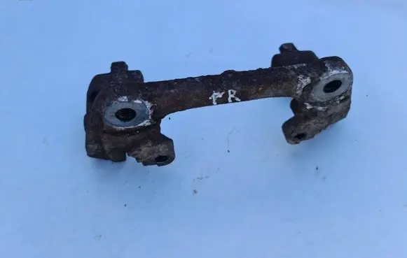 Volvo S60 Front Brake Caliper Pad/Carrier 