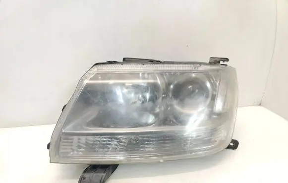 Suzuki Grand Vitara II Headlight/headlamp 10059079
