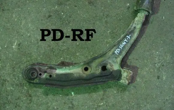 Nissan Sunny Front lower control arm/wishbone 64834792