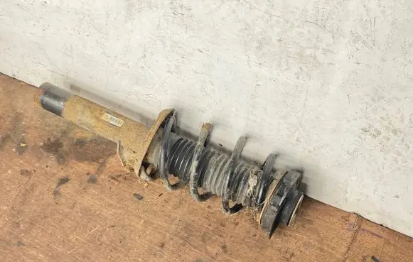 Front shock absorber with coil spring