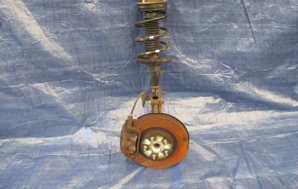 Front wheel hub spindle knuckle