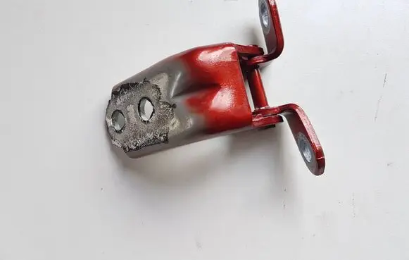 Front door lower hinge