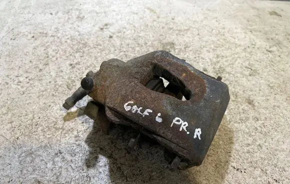 Volkswagen Golf VI Front brake caliper