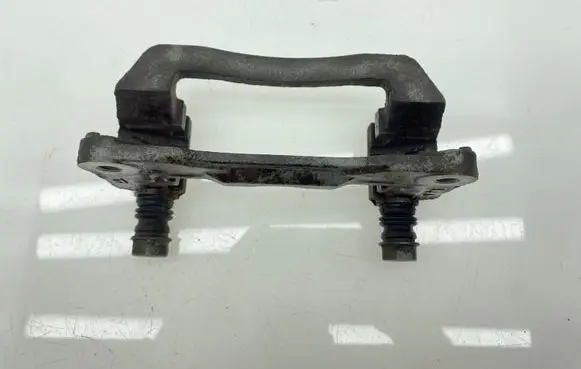 Subaru Legacy Brake caliper pad carrier rear 