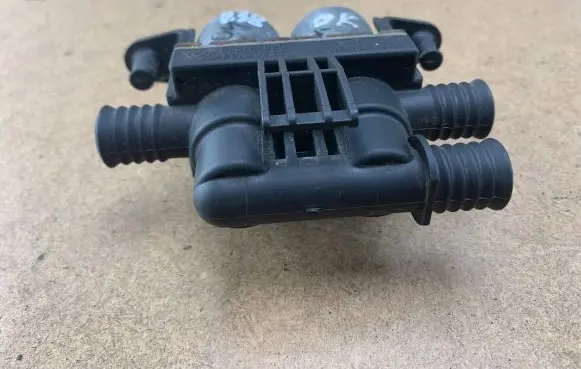 Coolant heater control valve