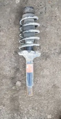 Volkswagen Golf IV Front shock absorber with coil spring 