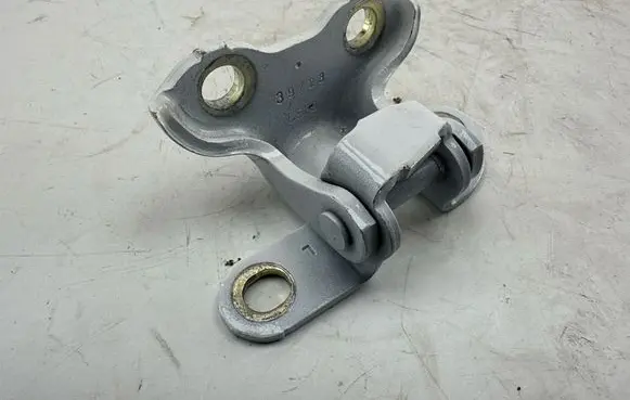 Rear door upper hinge