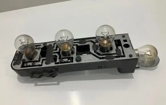 Mercedes-Benz C W203 Tail light bulb cover holder