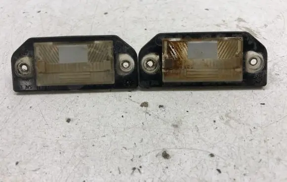 Volkswagen PASSAT B5 Number plate light 3B0943021