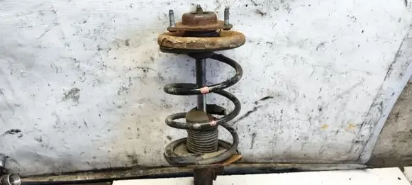 Mitsubishi Lancer X Front shock absorber with coil spring 
