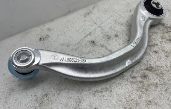Tesla Model Y Front lower control arm/wishbone 104435900a