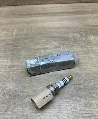 Volkswagen Bora Spark plug 101000051AA