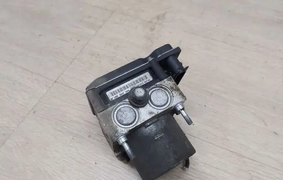 Nissan Primera ABS control unit/module 47660AV712