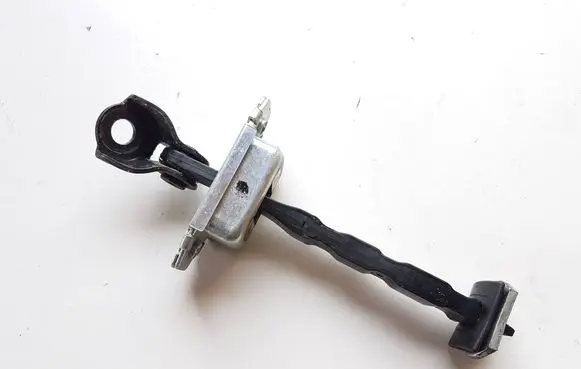 Front door check strap stopper