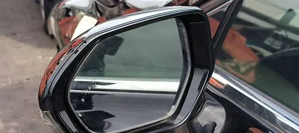 Front door electric wing mirror