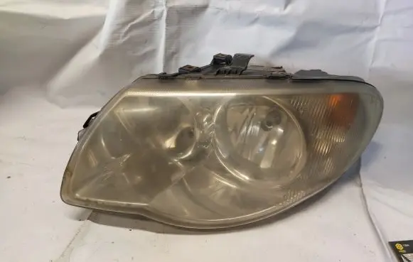 Chrysler Voyager Headlight/headlamp 04857831AB