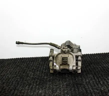 Volkswagen Jetta VII Rear brake caliper 5QM615405
