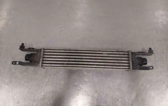 Opel Corsa D Intercooler radiator 872051000