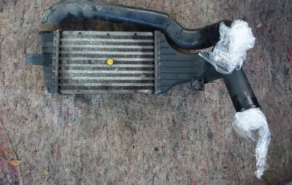 Opel Zafira A Intercooler radiator 9129519