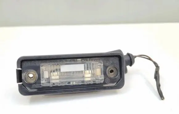 Volkswagen Golf V Number plate light 1J6943021B