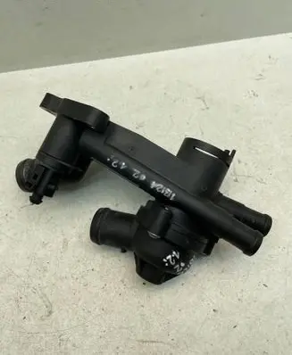 Thermostat/thermostat housing
