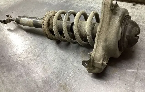 Front shock absorber with coil spring