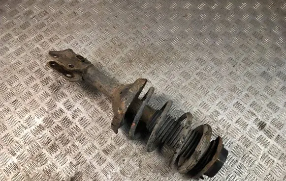Subaru Forester SG Front shock absorber with coil spring
